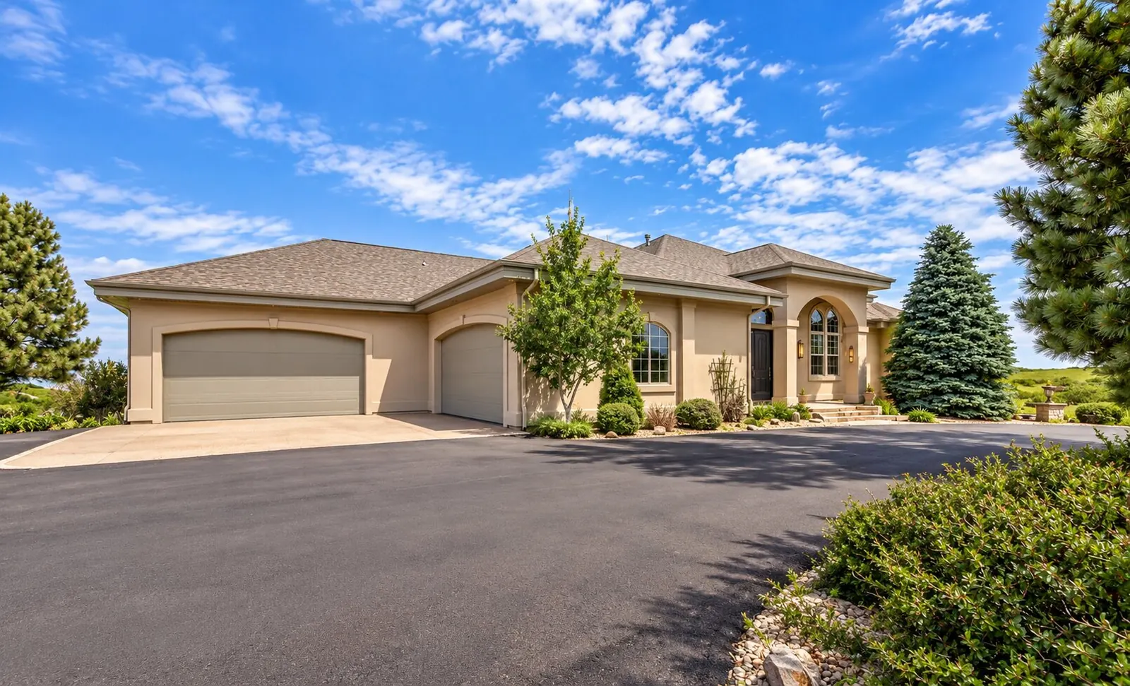 Custom home with arched entry